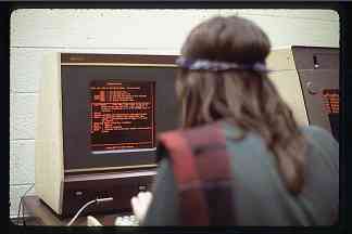 An image that shows a student using PLATO, a first-generation live chat software in 1973.